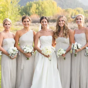 Detail shot of elegant bridesmaid knot necklaces, perfect for wedding party styling and gifts.