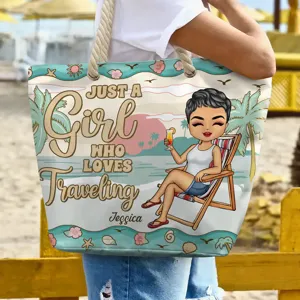 Close-up detail of the canvas beach tote bag featuring a cute travel cartoon print and rope handles.