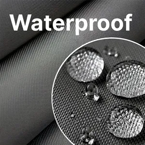 Waterproof fabric detail for travel bag, high density grey material with water beading effect.