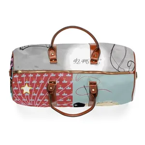 Artistic print travel duffel bag with brown leather handles and durable shoulder strap design.