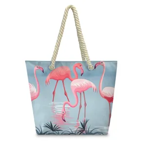 Canvas beach tote bag with flamingo print and rope handles for summer vacation and daily use.