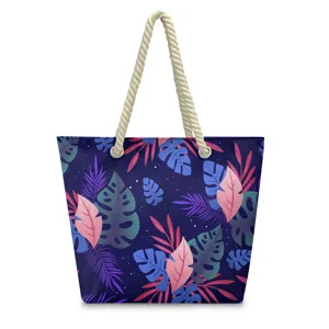 Hawaiian style beach casual canvas shoulder bag with tropical leaf print and sturdy rope handles.
