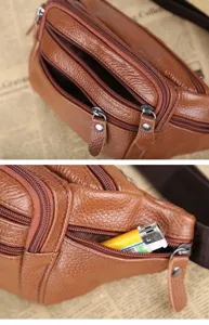 Detailansicht der braunen Leder-Gürteltasche mit mehreren Reißverschlussfächern
