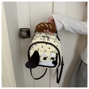 Zaino mini con simpatico cucciolo animato, motivo a stelle e manico in peluche.