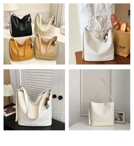 Stylish woven bucket bag with large capacity, chic shoulder and crossbody design for summer.
