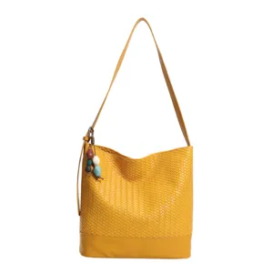 Yellow woven leather bucket bag chic shoulder crossbody bag with charming bead pendant