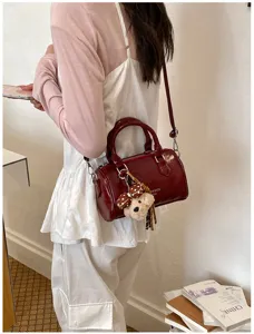 Korean style cute plush pendant pillow bag for women, versatile shoulder crossbody handbag.