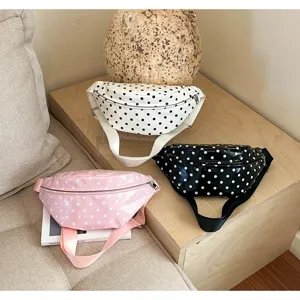 Detailed view of fashionable polka dot fanny pack, casual chest bag for daily wear and travel.