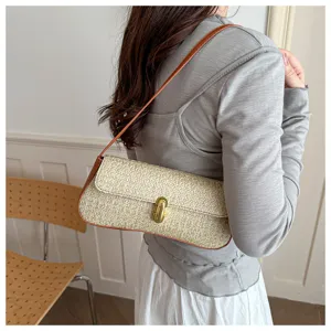 Sac à épaule tissé en paille élégant pour femmes, sac sous les bras chic à verrou pour bureau.
