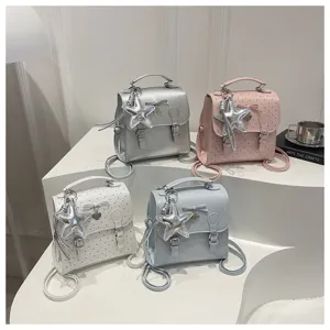 Sweet polka dot women mini backpack casual Korean style student school bag with bow charm.
