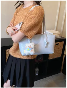 Vintage commuter large capacity underarm shoulder bag for women with cute plush bear pendant.