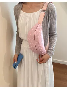 Casual pink polka dot chest bag for women, stylish fanny pack and lightweight crossbody bag.