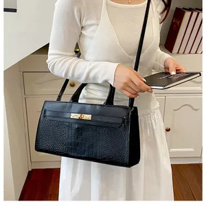 Elegante schwarze Krokodilmuster Handtasche mit Goldschloss, vielseitige Umhängetasche.