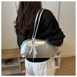 Silver metallic shoulder bag with pearl bow, trendy daily pillow handbag for women new.