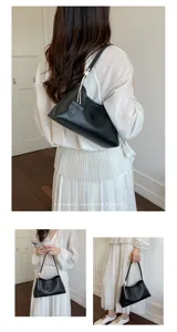 Minimalist black leather underarm shoulder bag for women chic everyday commuting tote