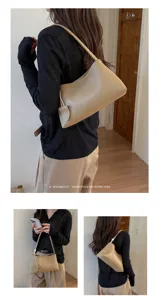 Minimalist leather shoulder bag for women, chic retro underarm hobo bag, stylish commuting tote.