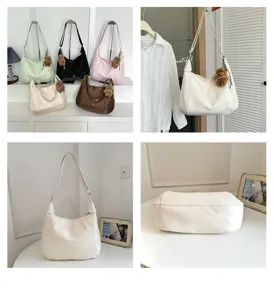 Women casual large capacity shoulder bag stylish tote with cute bear pendant for daily use.