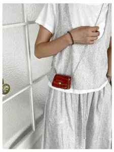 Mini crocodile pattern crossbody bag detail shot, stylish single shoulder bag for women and kids.
