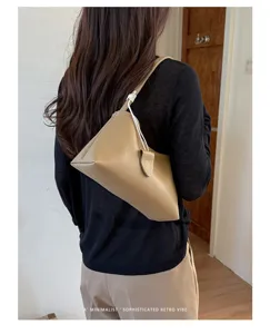 Chic minimalist shoulder bag for women, stylish khaki retro PU leather underarm handbag.