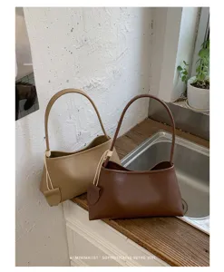 Stylish minimalist women underarm shoulder bag, trendy commuter leather handbag for summer.