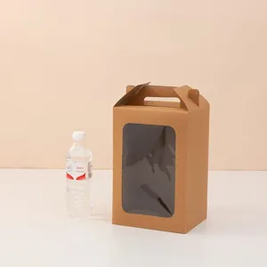 Detail of brown kraft paper gift bag with handle and clear window for scale reference.