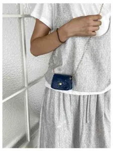 Mini crossbody bag for women, stylish navy blue stone pattern small shoulder purse with chain.
