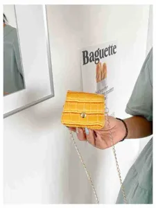 Trendy mini yellow crocodile pattern crossbody bag with chain strap for women and kids.