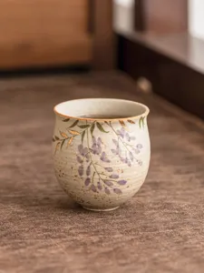 Hand-painted wisteria ceramic tea cup with gold accent, elegant master tasting cup for home.
