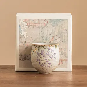 Hand-painted ceramic tea cup with wisteria flowers and gold tracing, elegant master tea tasting cup.