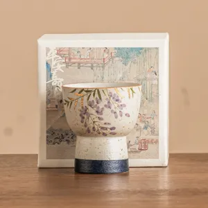 Hand-painted wisteria ceramic teacup high-stem tasting cup traditional tea set elegant design.
