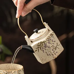 Théière hexagonale en céramique peinte à la main avec or et glycine pour thé kung-fu.