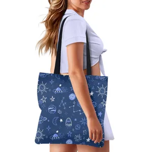 Fashion canvas tote bag for women with cute space planet doodle print, casual and practical.