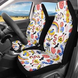 Universal front car seat covers with playful colorful cartoon monster pattern for interior decor.