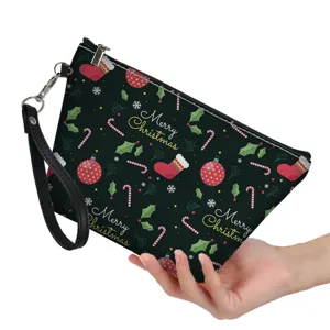 Christmas PU leather cosmetic bag with festive print, handy wrist strap and secure zipper close.