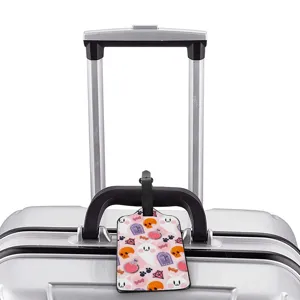 Cute cartoon ghost pattern luggage tag for travel suitcase, durable ID card holder bag label.