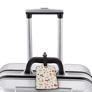 Travel luggage tag with cute fruit pattern, durable suitcase ID label for easy travel identification.