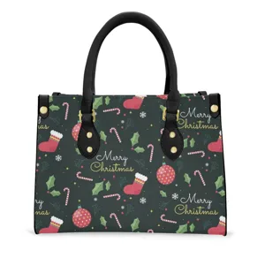 Sac à main en cuir de Noël avec imprimé festif, poignées noires et détails dorés.