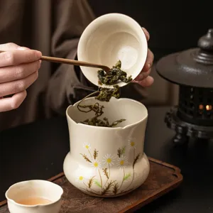 Hand-painted ceramic tea waste jar with daisy pattern, elegant tea wash container for ceremony.