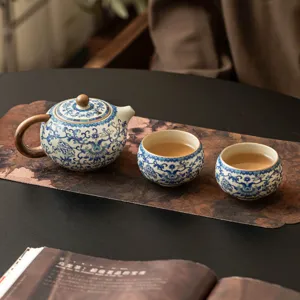 Exquisito juego de té de cerámica azul y blanca con tetera Xishi y tazas para regalo elegante