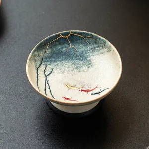 Tazón de té de cerámica hecho a mano con motivo de carpa koi pintado a oro taza de té tradicional
