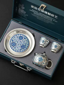 Silver-plated porcelain kung fu tea set gift box with teapot cups and saucer for tea.