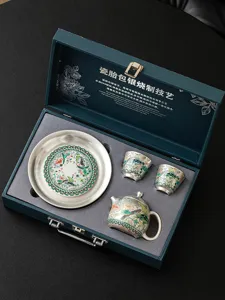 Exquisite silver-plated porcelain tea set featuring traditional fish pattern in box