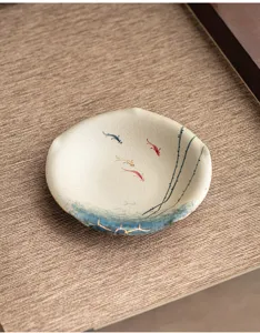 Hand-painted ceramic teapot holder with koi fish pattern, retro tea mat for loose leaf tea.