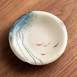 Hand-painted ceramic tea cup saucer pot holder dry bubble tray with cute fish pattern.