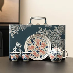 Goldfish gilt silver tea set gift box with one teapot and two cups for traditional tea.