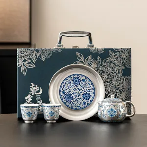 999 Silver-Plated Ceramic Kung Fu Teaware Traditional Chinese Hand-Painted Lotus Pattern Tea Kettle Cups Tray Gift Box Premium Chinese Teaware Collection