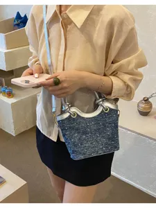 Korean style denim bucket bag for women, trendy silver trim single shoulder commuting handbag.