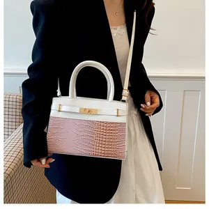 Stylish contrast color large capacity shoulder bag with top handle and chic lock detail.