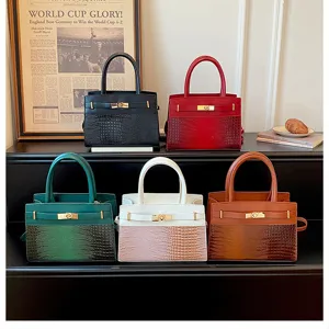 Fashion casual large capacity leather handbag with crocodile pattern and metal lock design.