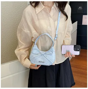 Trendy niche design women crossbody dumpling bag, stylish bow detail and chic star print look.